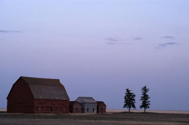 Farm buildings at dusk