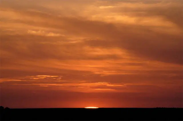Sunset over the prairie horizon